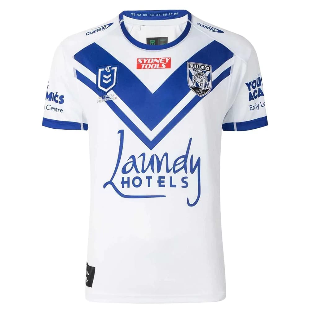 Maglia da rugby per bambini Canterbury Bulldogs NRL Home: maglia da rugby bianca con dettagli blu, perfetta per i giovani tifosi.