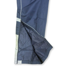 Pantalone da rugby BLK blu con zip laterale apribile per allenamento.