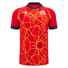 Maglia Rugby Scozia Training Macron rossa con grafica astratta gialla, stagione M24-25.