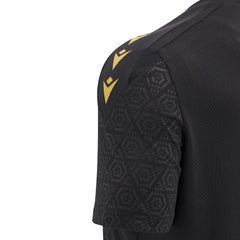 Maglia da allenamento per il rugby del Galles 2025: maglia da rugby nera con logo dorato e design geometrico sulle maniche.