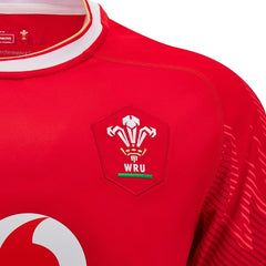 Maglia Rugby Galles Macron Home 2025 da uomo, rossa, con stemma WRU.