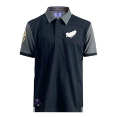 Polo da rugby vintage All Blacks 1938: polo nera e grigia con l'iconico logo della felce argentata. Rugby neozelandese.