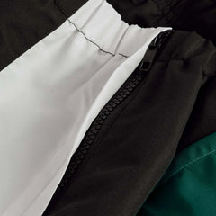 Dettaglio zip e pannelli color block Pantalone Rugby Irlanda Legends 2026 in microfibra.