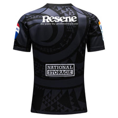 Maglia da trasferta Hurricanes Super Rugby Pacific 2024-25: maglia da rugby nera da ragazzo con esclusivo design tribale e loghi degli sponsor.