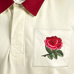 Polo rugby vintage bianco con colletto rosso e ricamo rosa Inghilterra.