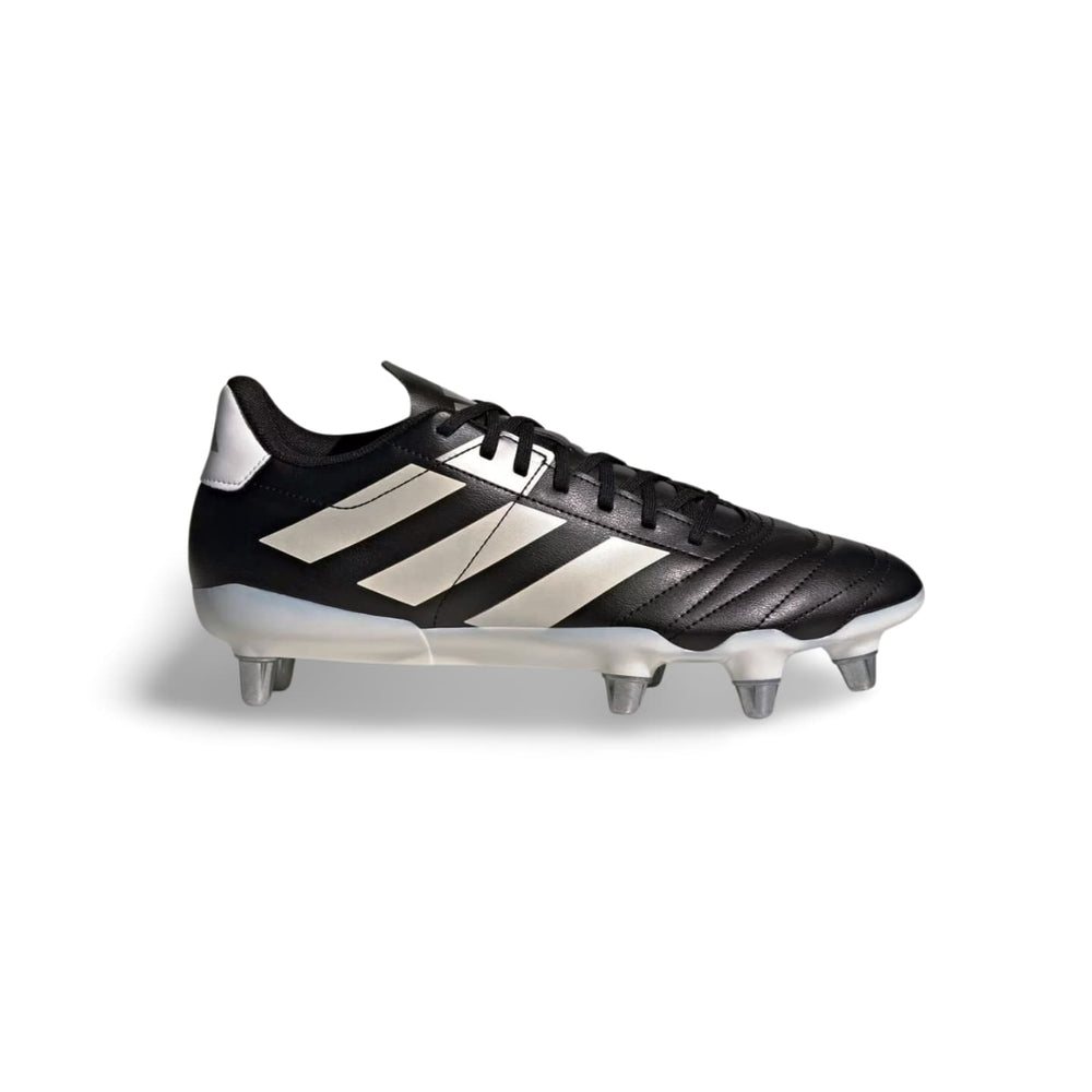Scarpini da rugby Adidas Kakari SG neri con dettagli metallici, suola per terreni morbidi.