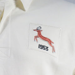 Maglia da rugby vintage del Sud Africa del 1953, bianca, con l'emblema degli Springbok ricamato.