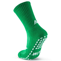 Calza ATAK SHOX MID GRIP verde con grip antiscivolo per sport.