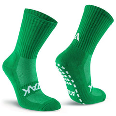 Calze verdi ATAK SHOX MID GRIP con grip antiscivolo sul tallone e pianta.