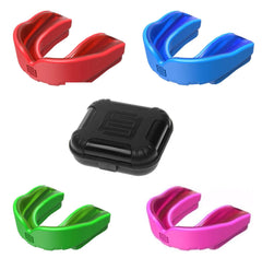 Paradenti Ignis Pro Makura: Paradenti professionale multicolore nei colori rosso, blu, verde e rosa, mostrato con custodia protettiva.