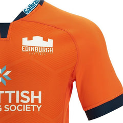 Maglia da trasferta dell'Edimburgo Rugby: autentica maglia da rugby arancione con stemma della squadra e loghi degli sponsor.