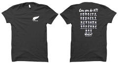 T-shirt rugby nera con stampa Haka neozelandese e felce argentata.