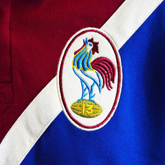 Polo rugby vintage Francia con gallo stilizzato e numero 13.