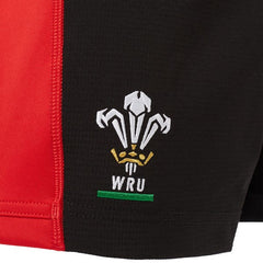 Pantaloncini da rugby Galles WRU training neri e rossi con stemma.