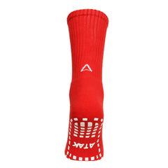 Calza ATK Mid Grip rossa con grip antiscivolo sul fondo e logo a freccia.
