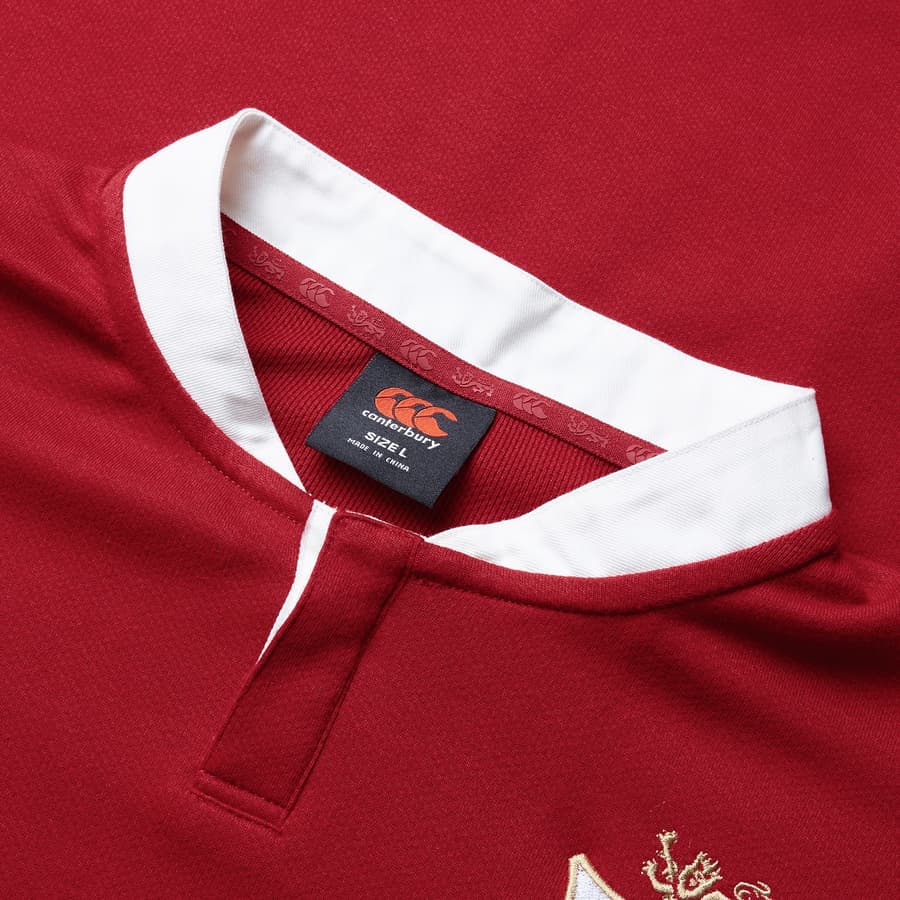 Maglia da rugby dei Canterbury British & Irish Lions: maglia da rugby rossa a maniche corte, taglia L, con colletto bianco.
