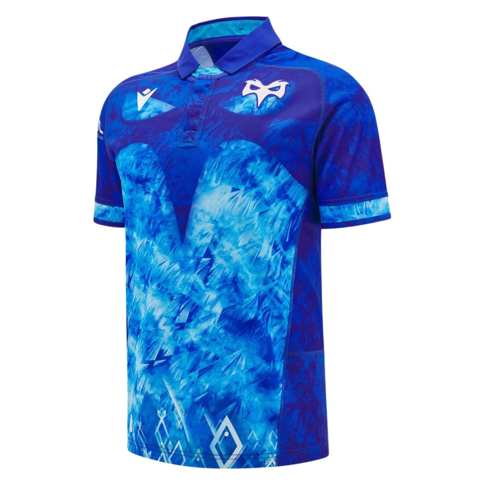 Maglia da rugby Ospreys 2025 Euro Kids: polo blu a maniche corte con motivo astratto ispirato al ghiaccio.