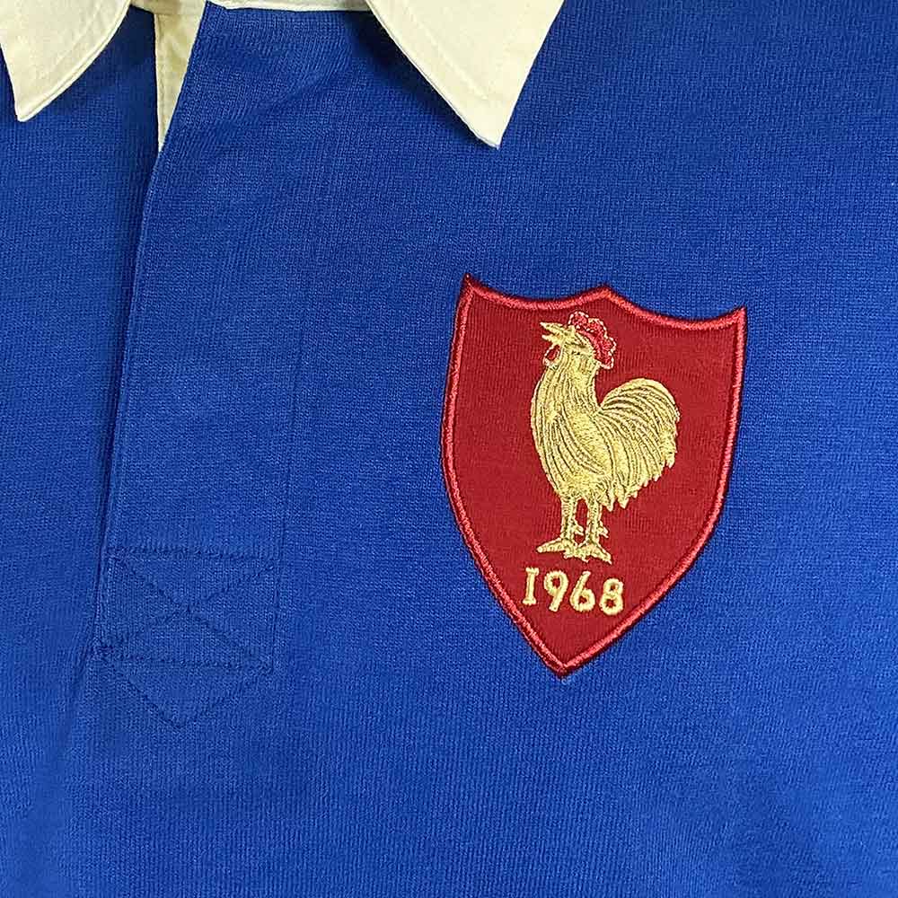 Maglia da rugby francese vintage del 1968: maglia da rugby blu con stemma rosso ricamato raffigurante un gallo dorato e la scritta "1968"