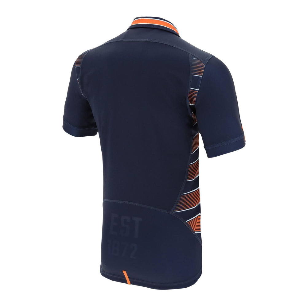 Maglia casalinga Edimburgo Rugby: autentica maglia da rugby a maniche corte blu navy con dettagli a strisce arancioni e bianche. "EST 1872"