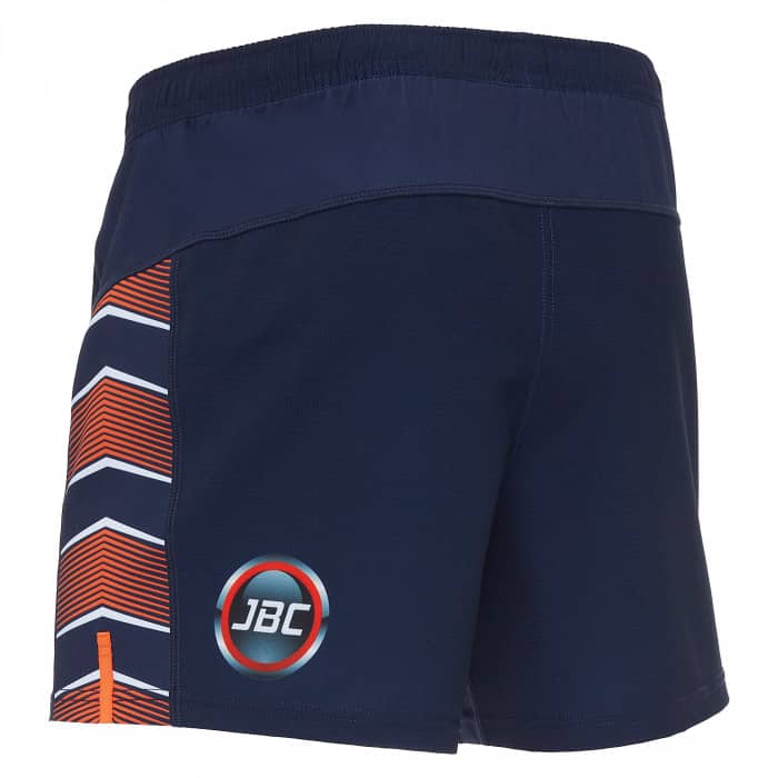 Pantaloncini Rugby Edimburgo Gara Bambino: Navy blue kids rugby shorts featuring orange & white chevron side stripes and JBC logo.