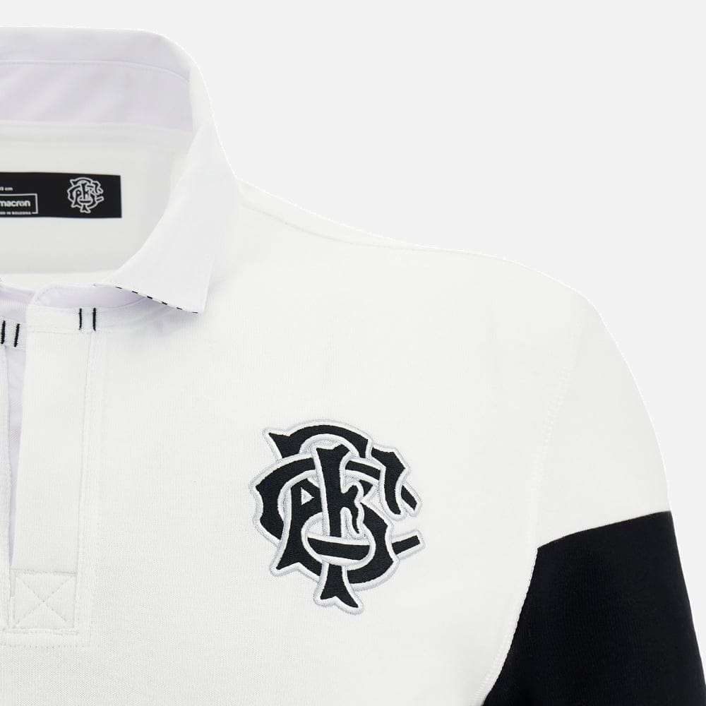 Maglia rugby Macron Barbarians uomo, cotone bianco e nero con stemma ricamato.