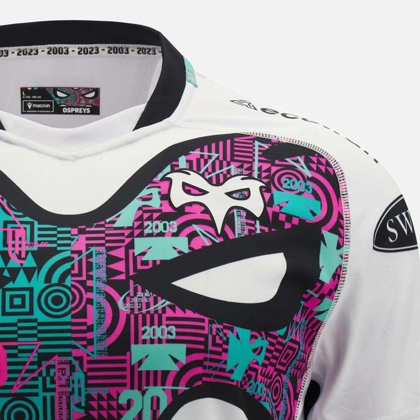 Maglia da rugby Ospreys 2024 Away: maglia bianca con design geometrico nero, rosa e verde acqua