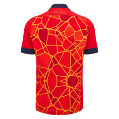 Maglia training rugby Scozia M24-25 rossa con grafica geometrica gialla.