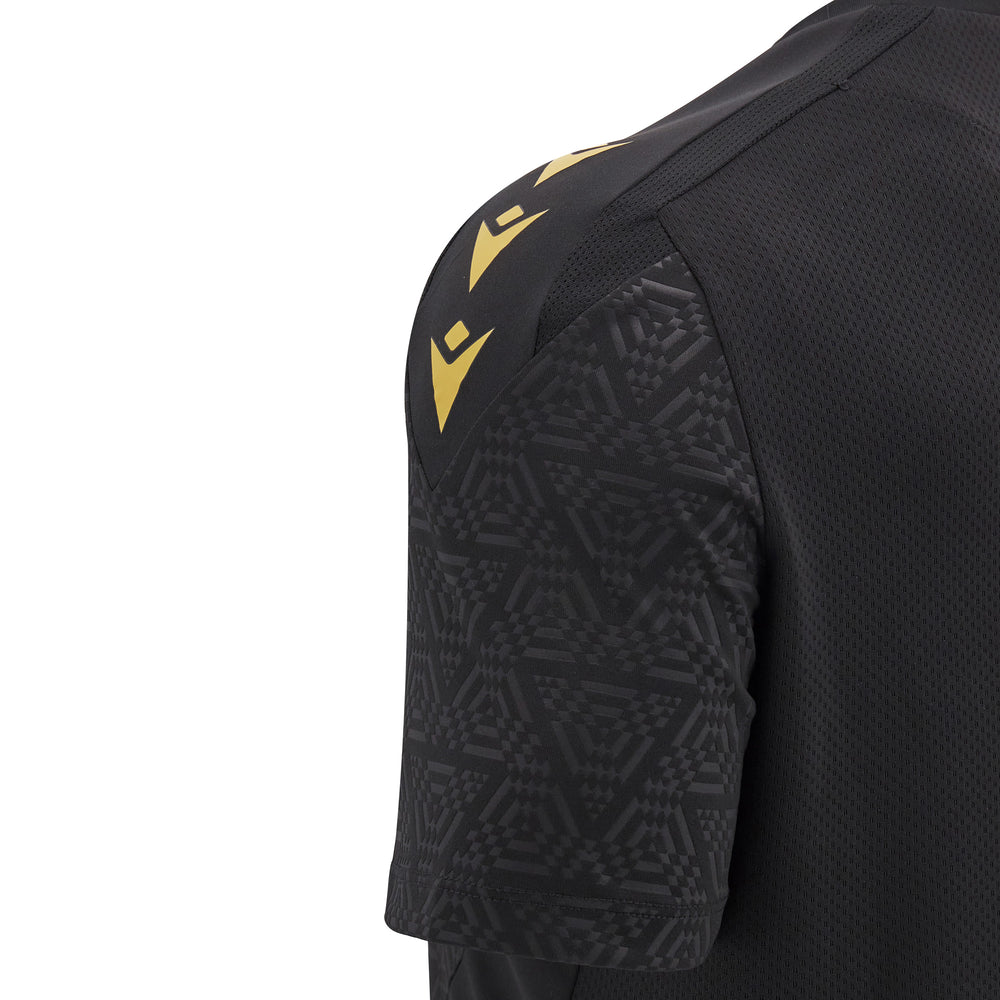 Maglia da allenamento per il rugby del Galles 2025: maglia da rugby nera con logo dorato e design geometrico sulle maniche.