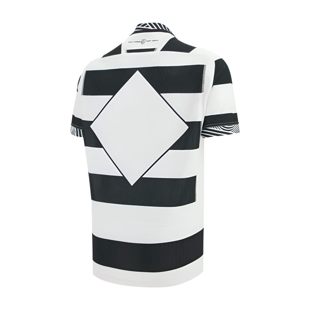 Maglia rugby Barbarians home 2026 Macron con design a righe bianche e nere e rombo centrale.