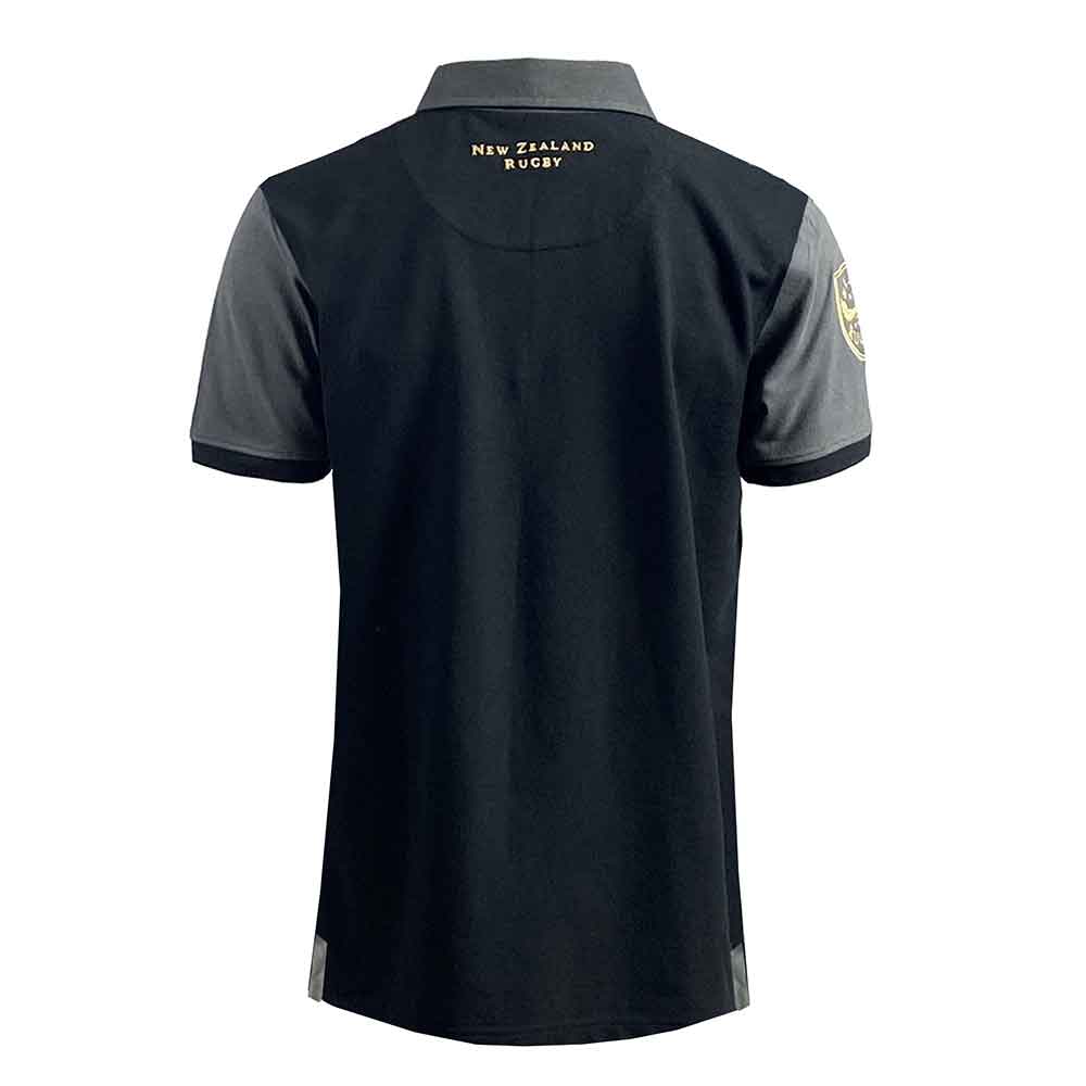 Polo Rugby All Blacks Vintage 1938: polo da rugby nera e grigia, vista posteriore. Design All Blacks.