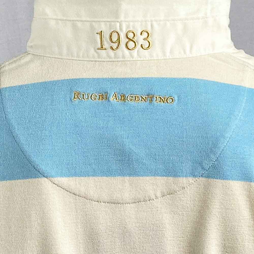 Maglia vintage Rugby Argentina 1983 a righe bianche e azzurre con ricamo.