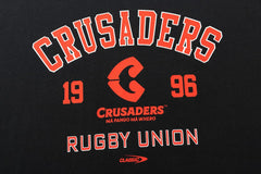 Maglia rugby Crusaders 1996 cotone, logo e scritte in arancione su nero.