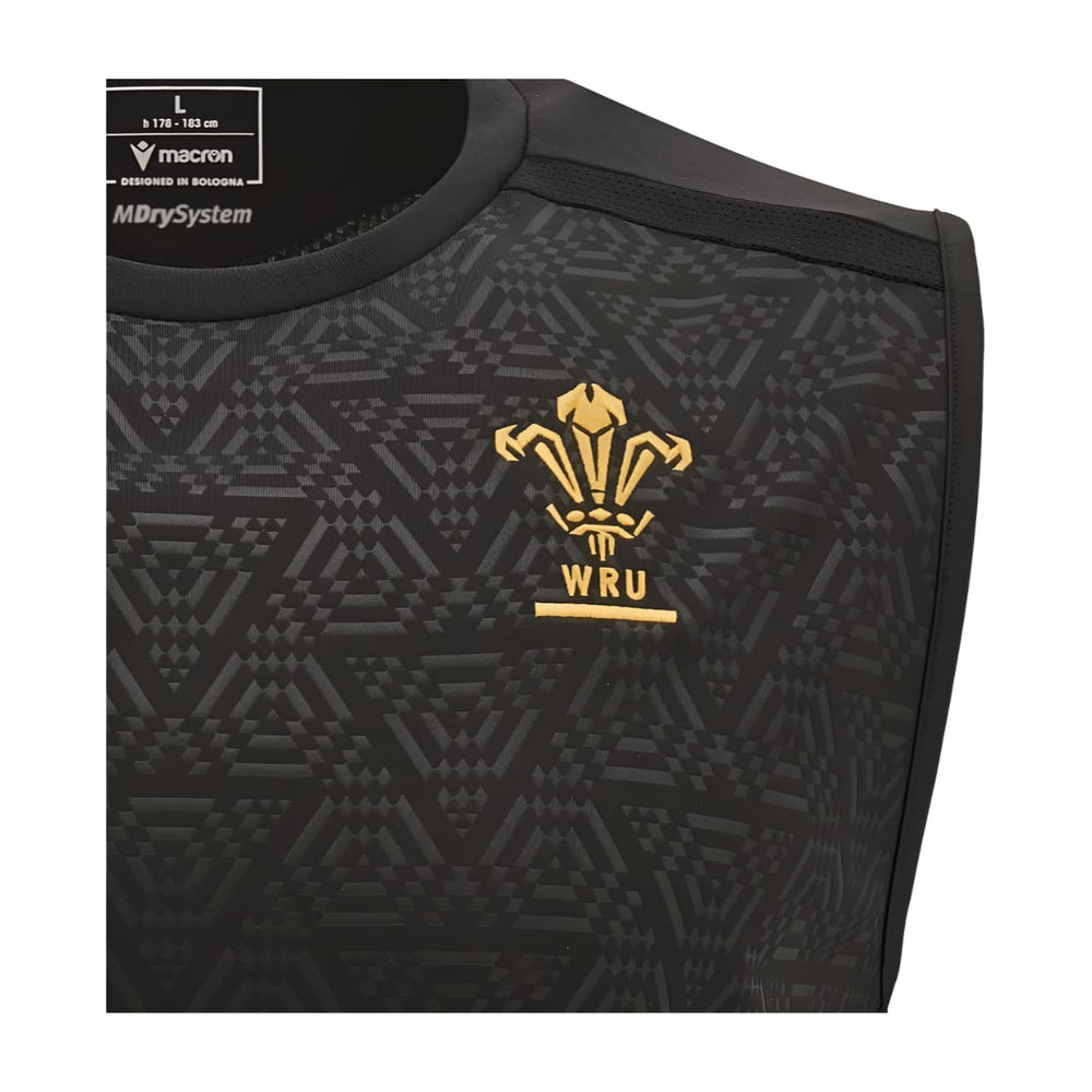 Maglia senza maniche del Galles Rugby 2025: maglia nera con logo del drago gallese dorato ed emblema WRU.