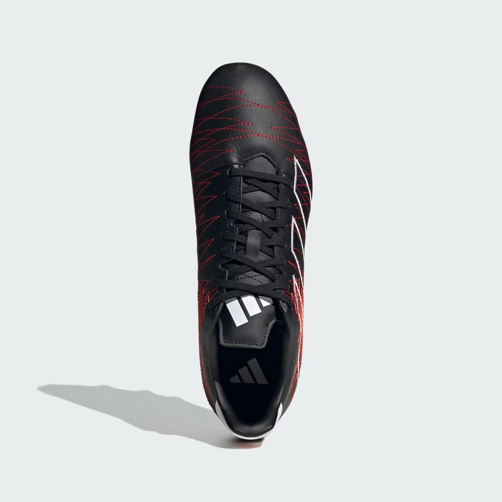 Scarpino da rugby Adidas Kakari elite SG nero con dettagli rossi e logo bianco.