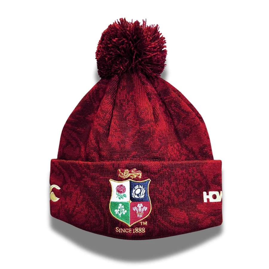 Zuccotto British & Irish Lions bordo pom pom: berretto da rugby rosso con pompon, decorato con l'emblema dei British & Irish Lions. Perfetto per l'inverno.