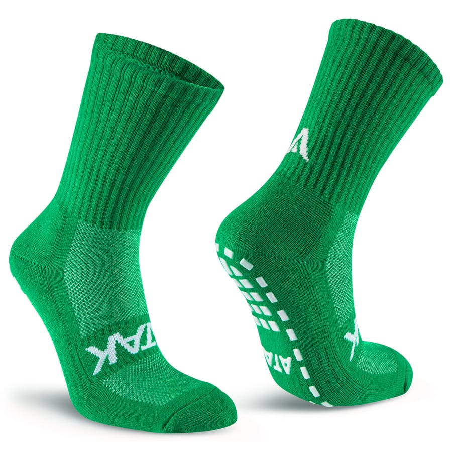 Calze verdi ATAK SHOX MID GRIP con grip antiscivolo sul tallone e pianta.