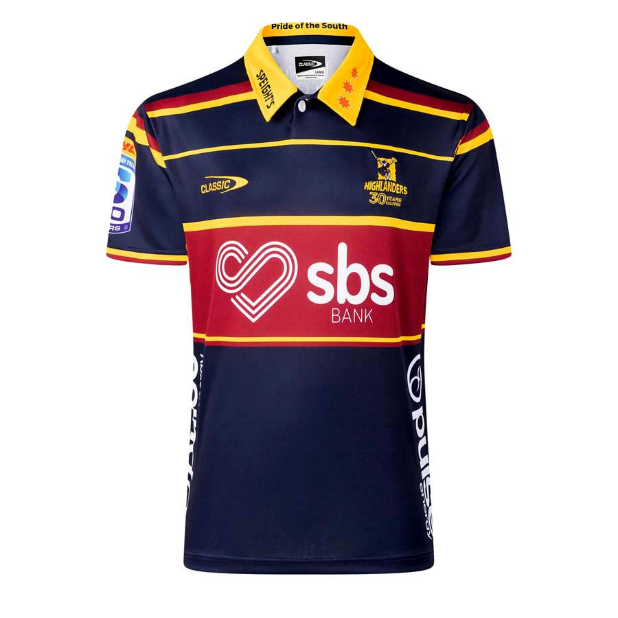 Maglia da rugby Highlanders 2026 Home PRO da ragazzo, blu con dettagli rossi e gialli.