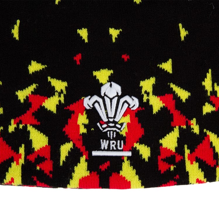 Zuccotto Rugby Galles 2026 WRU con stemma e design nero, rosso e giallo.