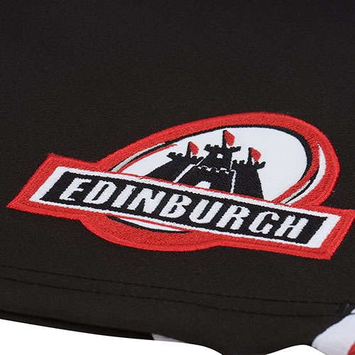 Pantaloncini ufficiali gara Edimburgo con stemma del castello e logo.