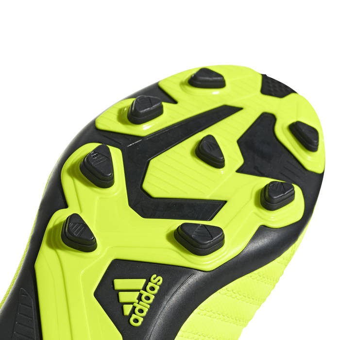 Suola scarpino Adidas X 18.4 FxG gialla con tacchetti specifici per terreno misto.