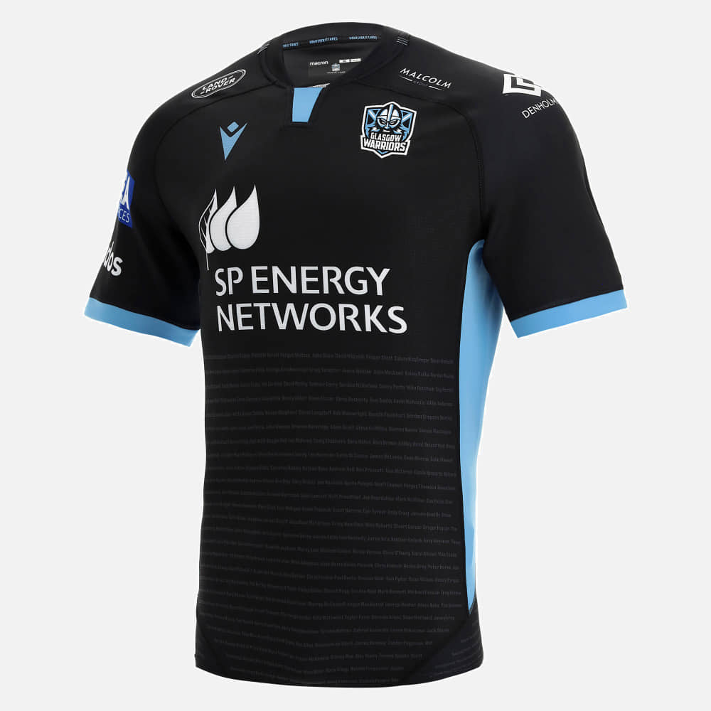 Maglia da rugby replica Glasgow Warriors Home Pro: maglia replica ufficiale nera e azzurra con logo della squadra e dettagli degli sponsor.