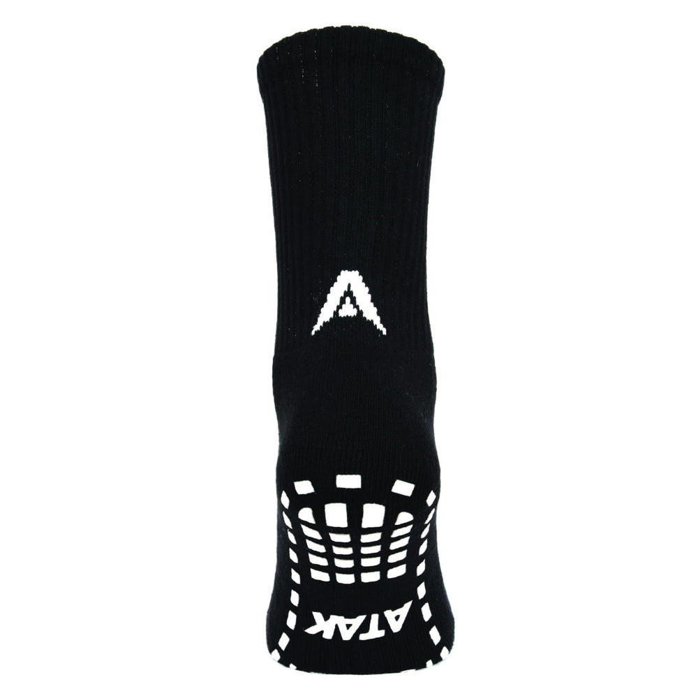 ATAK SHOX MID GRIP NERO: Calzini sportivi neri con fondo antiscivolo per una trazione superiore. Altezza a metà polpaccio.