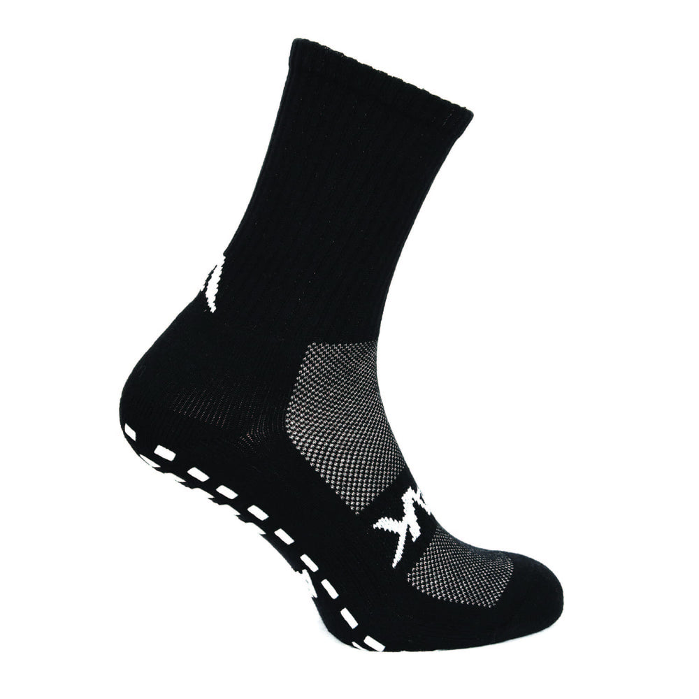 Calza sportiva nera CALZA ATAK SHOX MID GRIP con grip antiscivolo sul tallone e pianta.